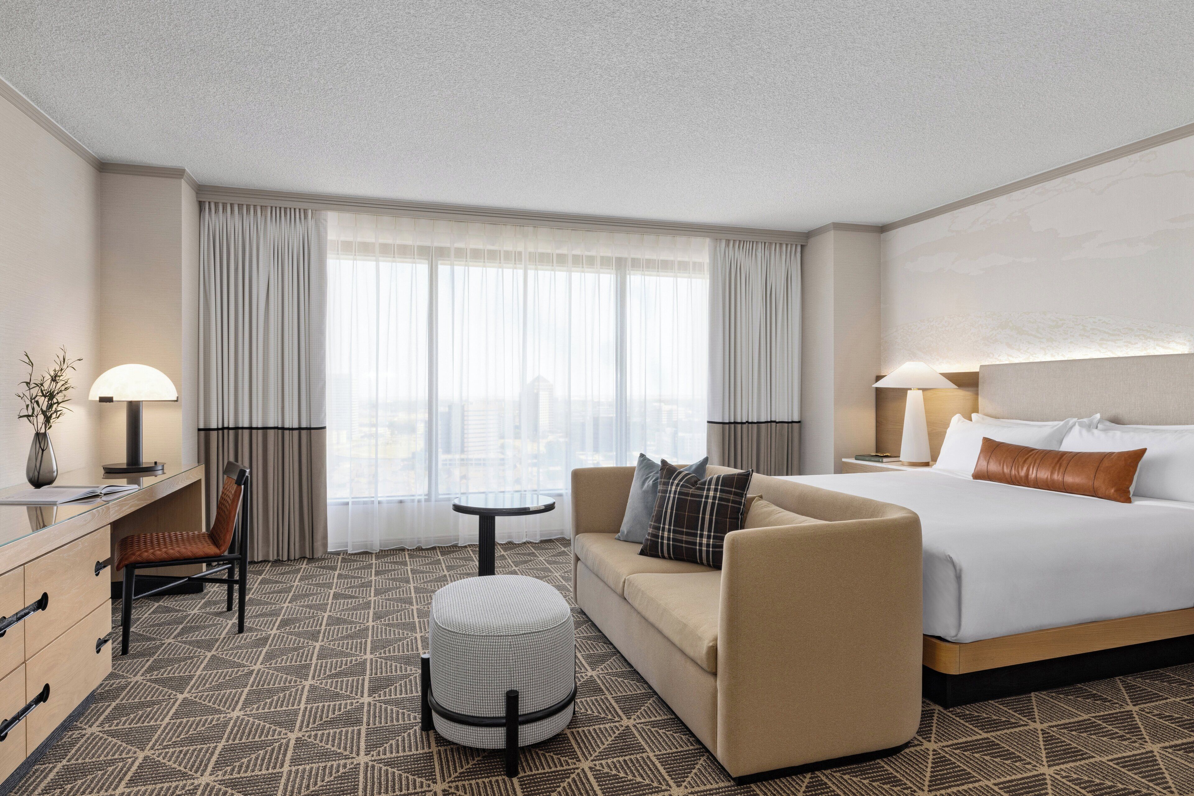 Premium bedding, down comforters, pillowtop beds, in-room safe
