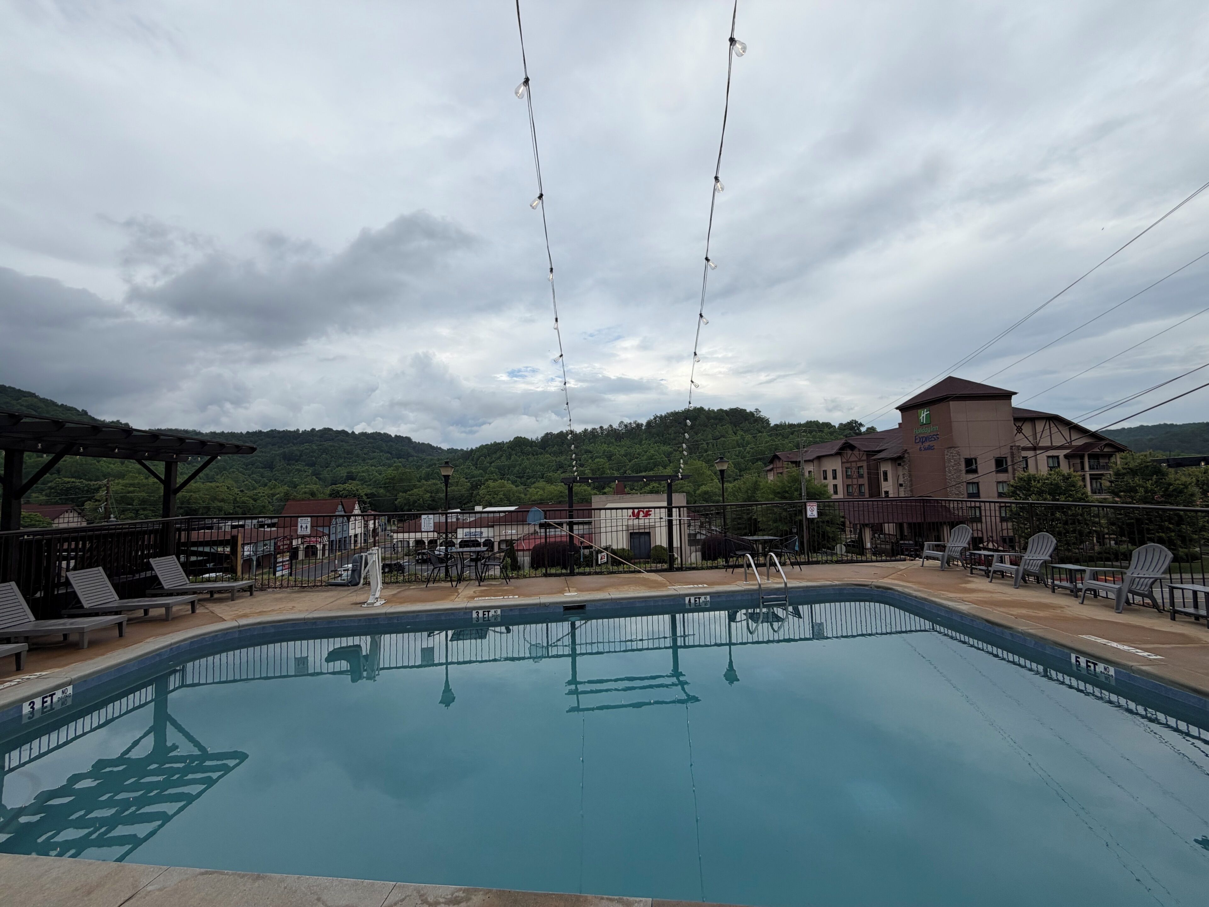 Seasonal outdoor pool, pool umbrellas, pool loungers
