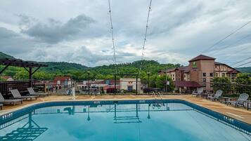 Seasonal outdoor pool, pool umbrellas, sun loungers