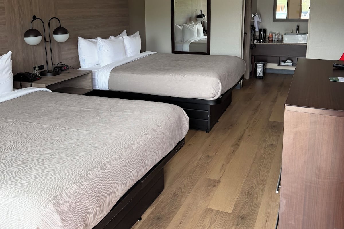 Standard Room, 2 Queen Beds, Non Smoking | Iron/ironing board, free cribs/infant beds, free WiFi, bed sheets