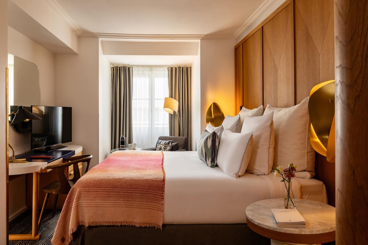 Deluxe Room | Premium bedding, minibar, in-room safe, individually decorated
