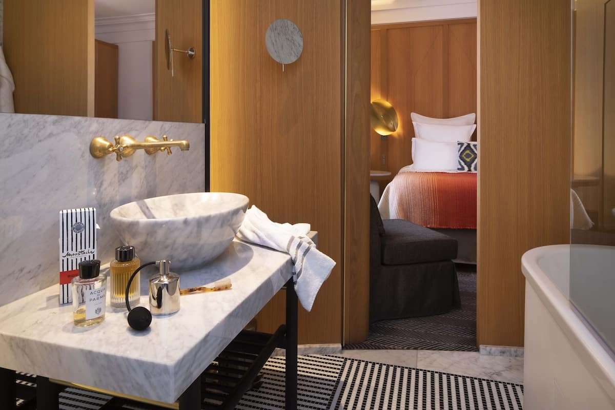 Superior Room | Bathroom | Designer toiletries, hair dryer, bathrobes, slippers