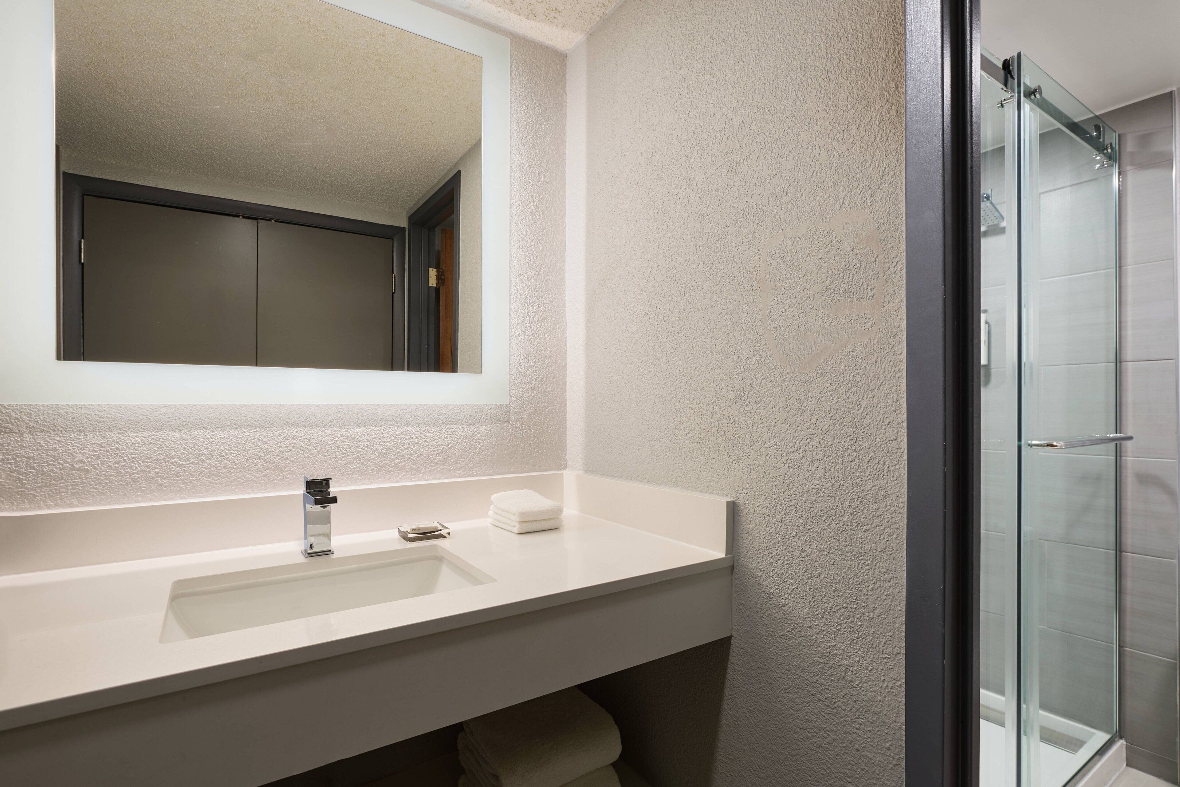 eco-friendly toiletries, hair dryer, towels, soap