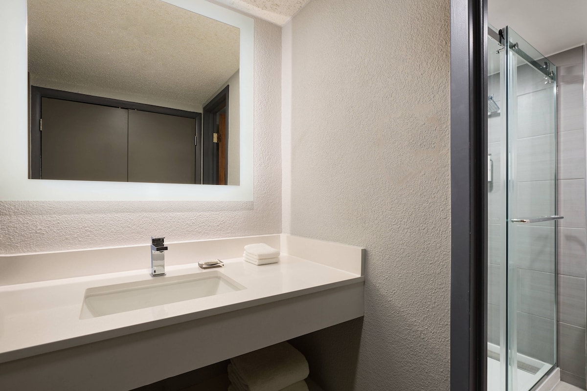 eco-friendly toiletries, hair dryer, towels, soap