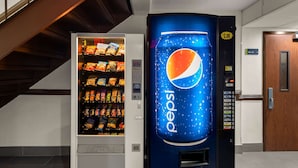 A vending machine with a Pepsi logo and a snack vending machine beside it. - Best Western Adena Inn (Chillicothe)
