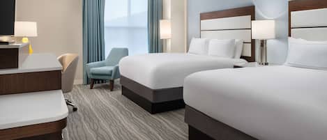 Premium bedding, down comforters, pillowtop beds, in-room safe