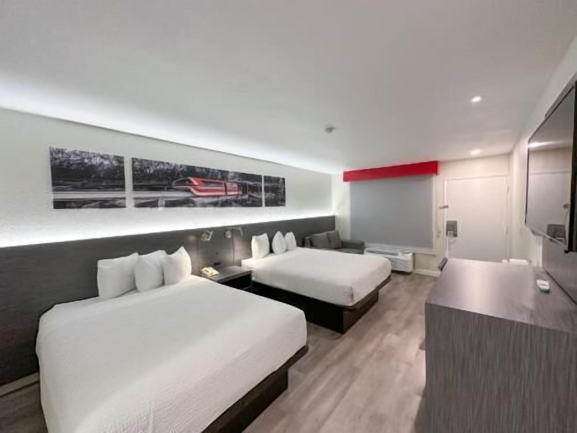 Desk, laptop workspace, iron/ironing board, cots/infant beds