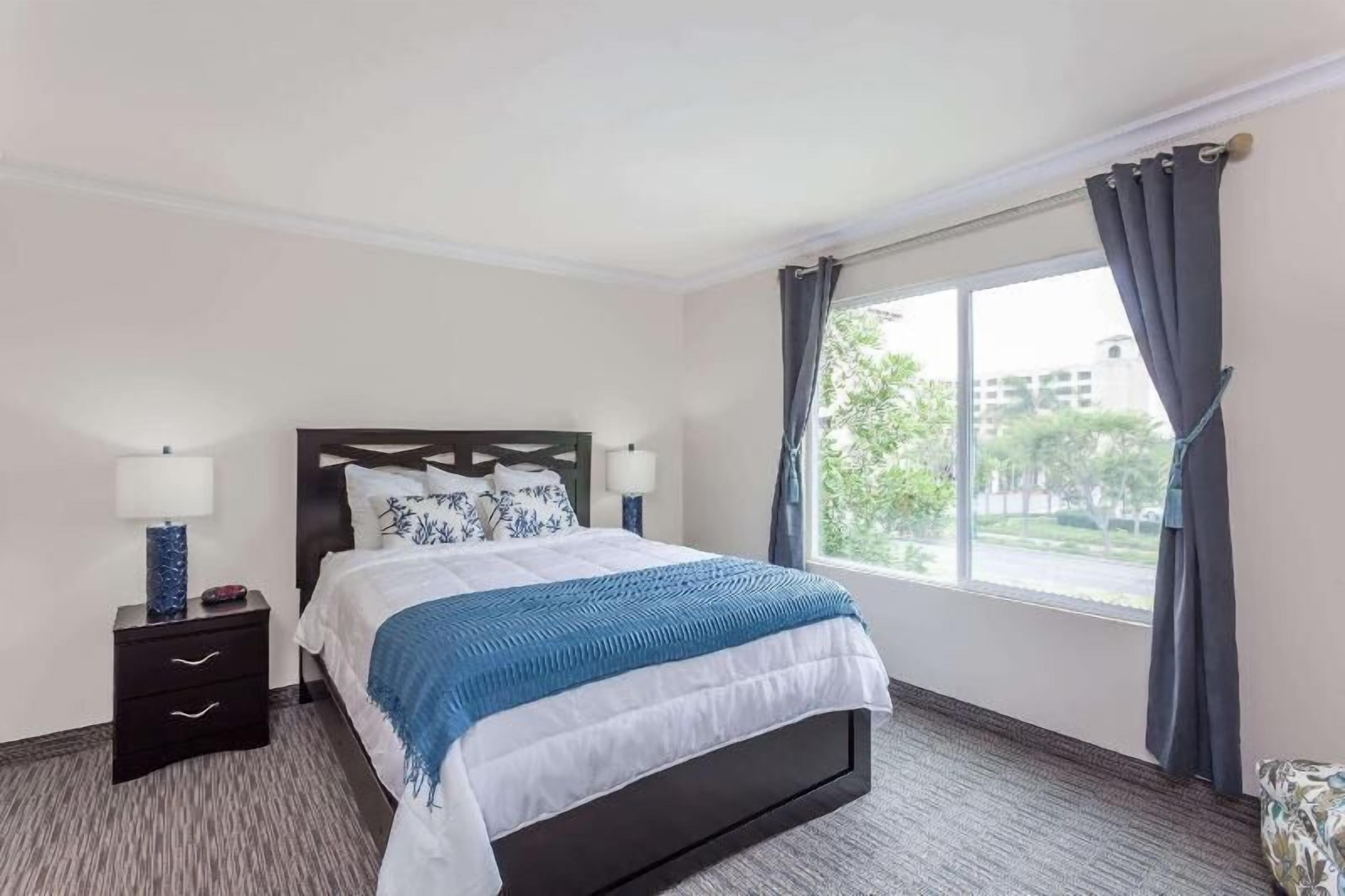 Desk, laptop workspace, iron/ironing board, cots/infant beds