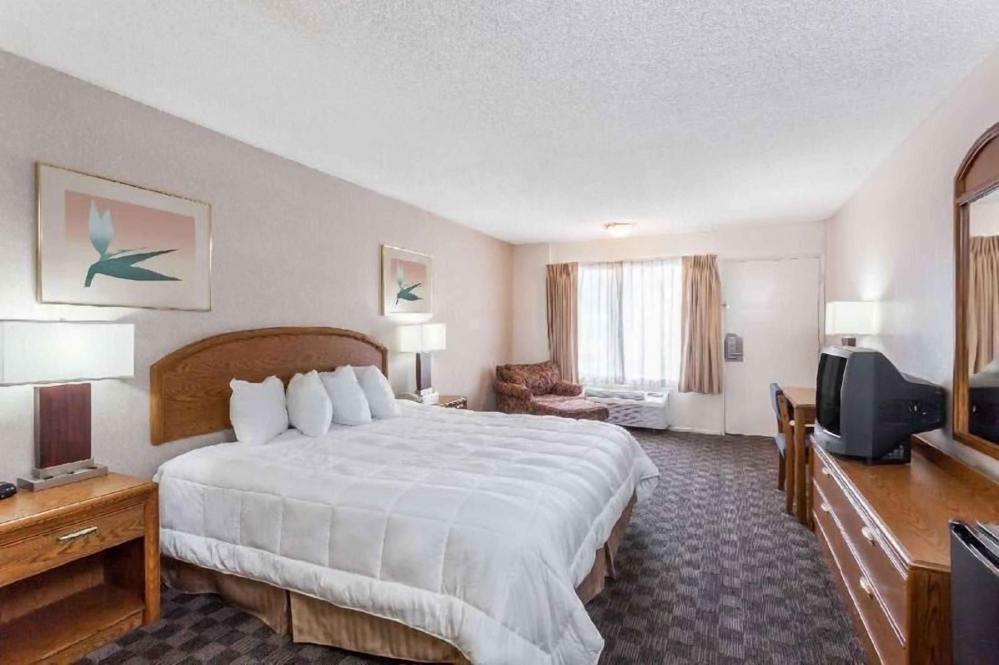 Desk, laptop workspace, iron/ironing board, cots/infant beds