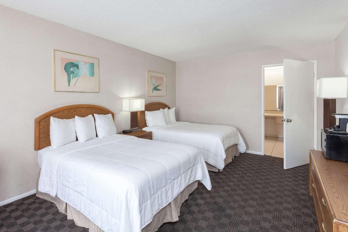 Desk, laptop workspace, iron/ironing board, cots/infant beds