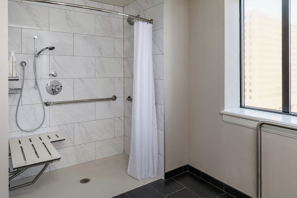 Eco-friendly toiletries, hair dryer, bathrobes, towels