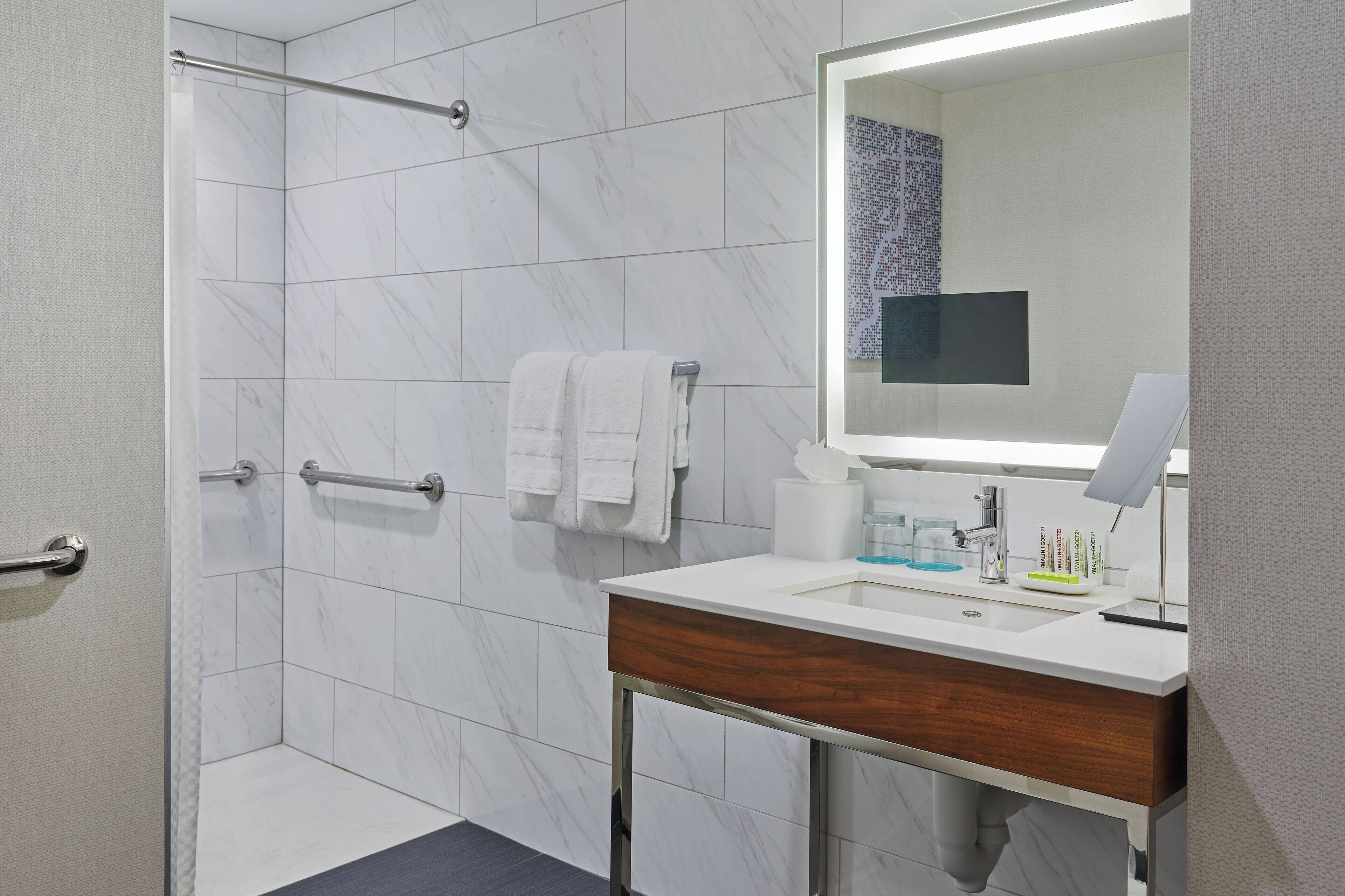 eco-friendly toiletries, hair dryer, bathrobes, towels