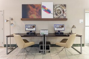 A conference room with two desktop computers, a printer, and two chairs. - Holiday Inn Philadelphia South - Swedesboro by IHG (Swedesboro)