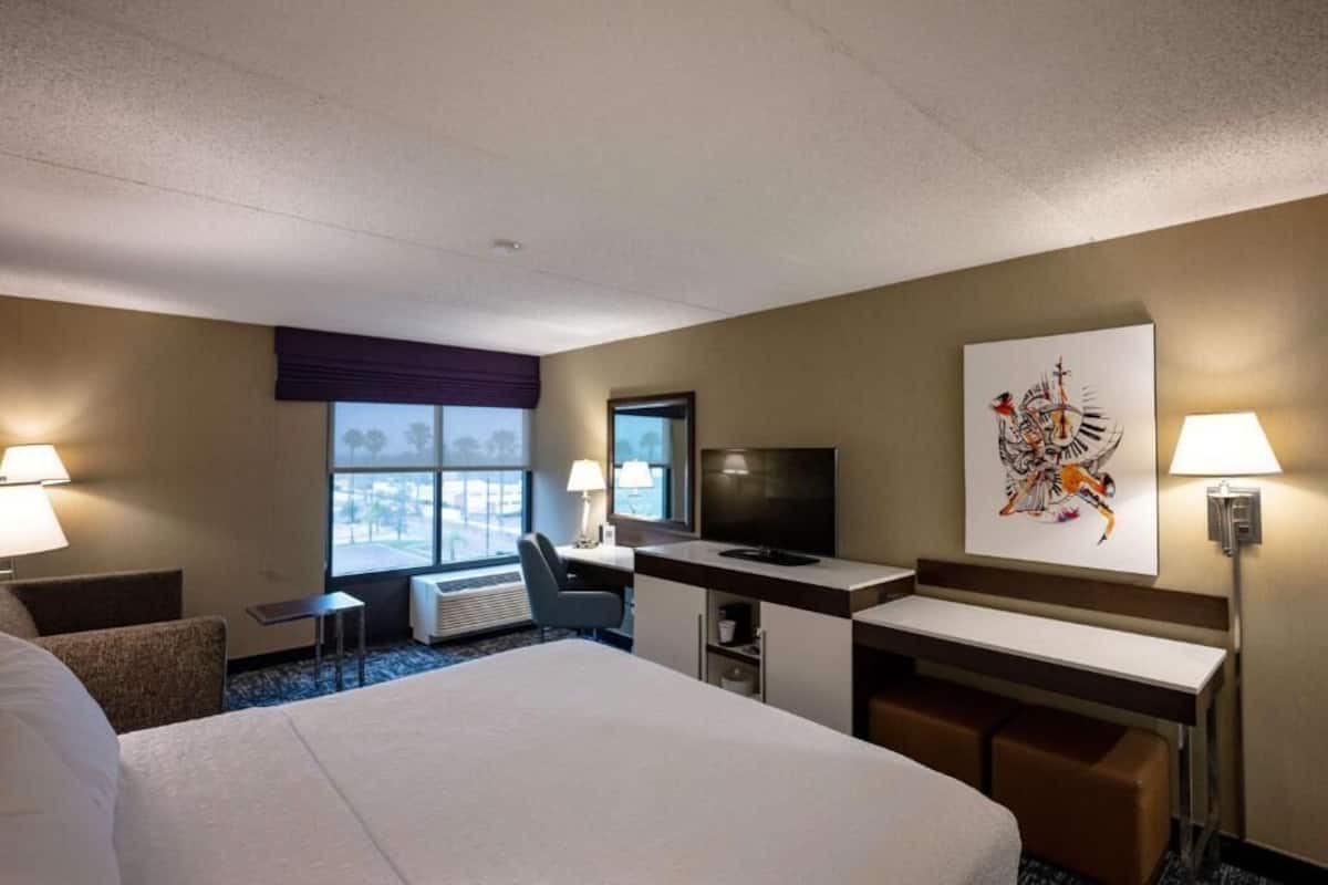 individually decorated, desk, laptop workspace, blackout curtains