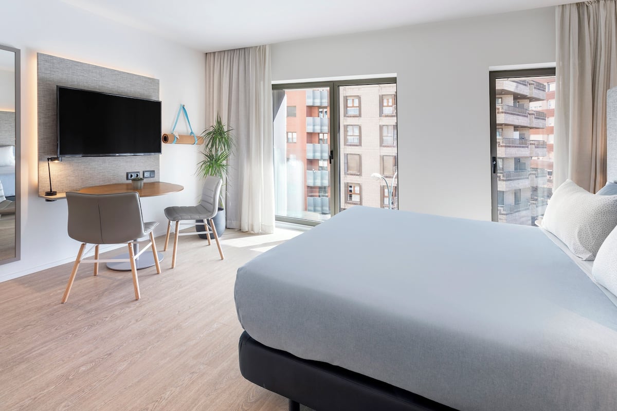 loft | premium bedding, free minibar items, in-room safe, desk