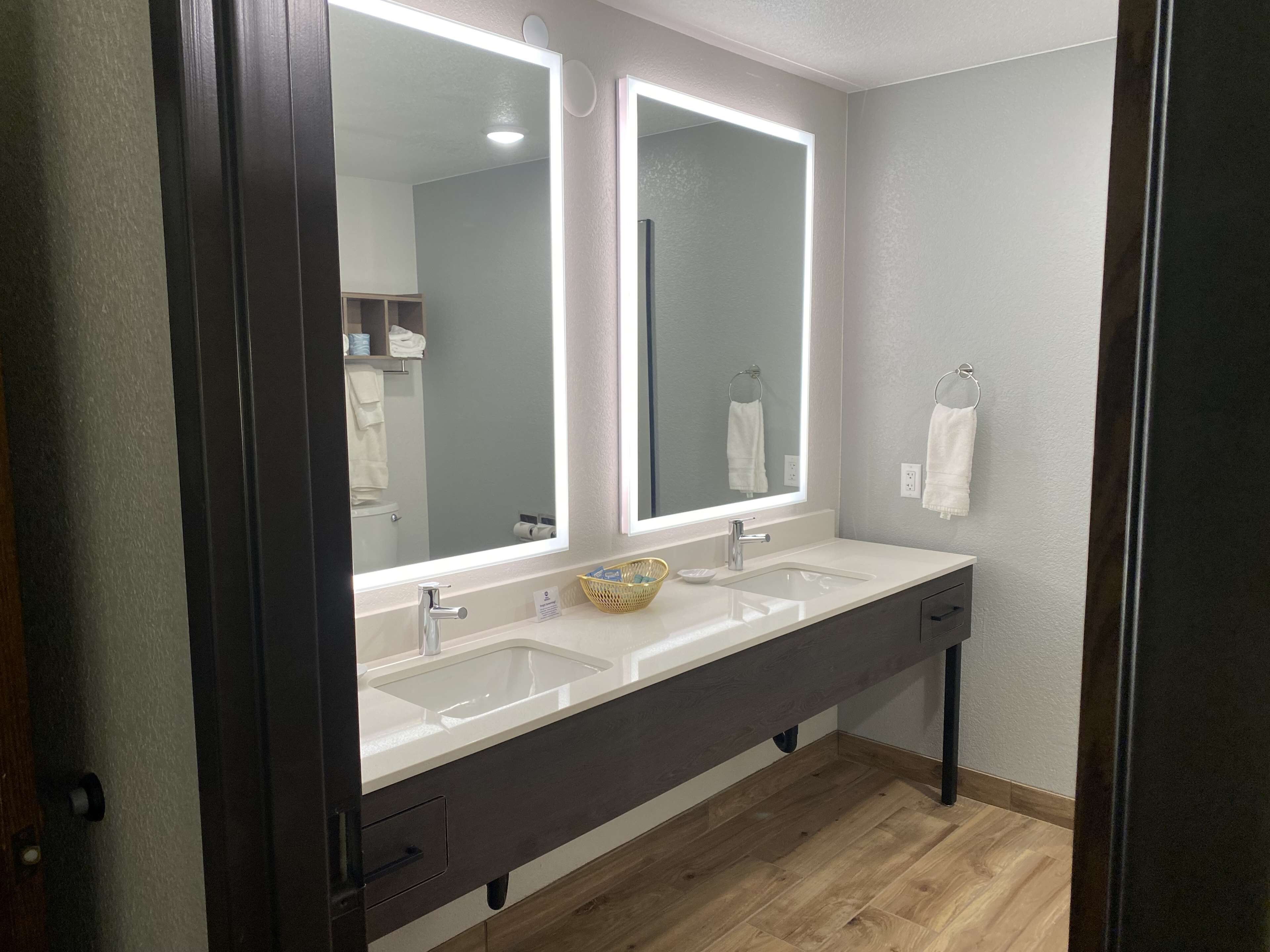 eco-friendly toiletries, hair dryer, towels