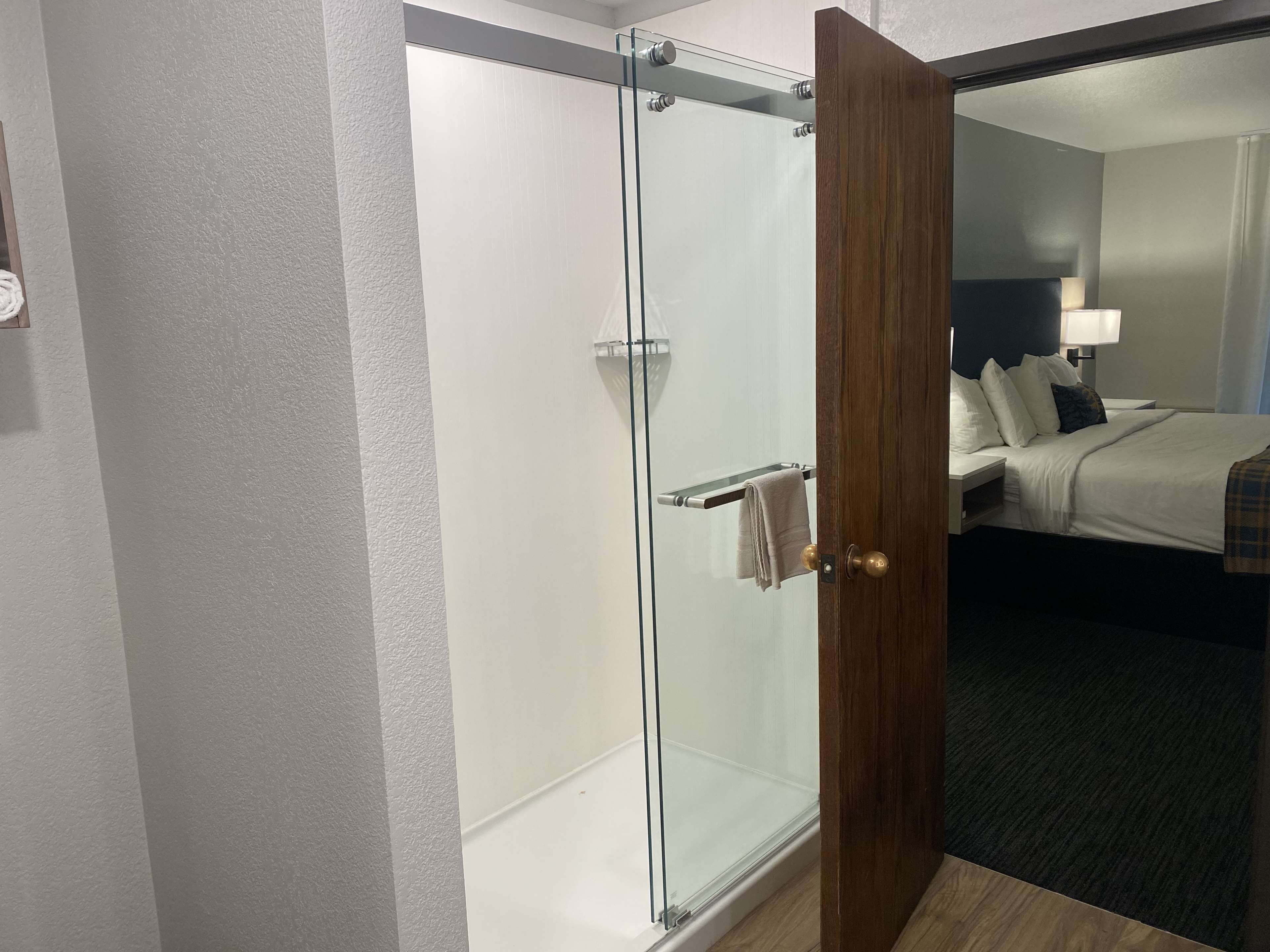 eco-friendly toiletries, hair dryer, towels