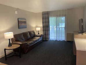 Suite, 1 King Bed, Non Smoking, Lake View | 1 bedroom, desk, laptop workspace, iron/ironing board