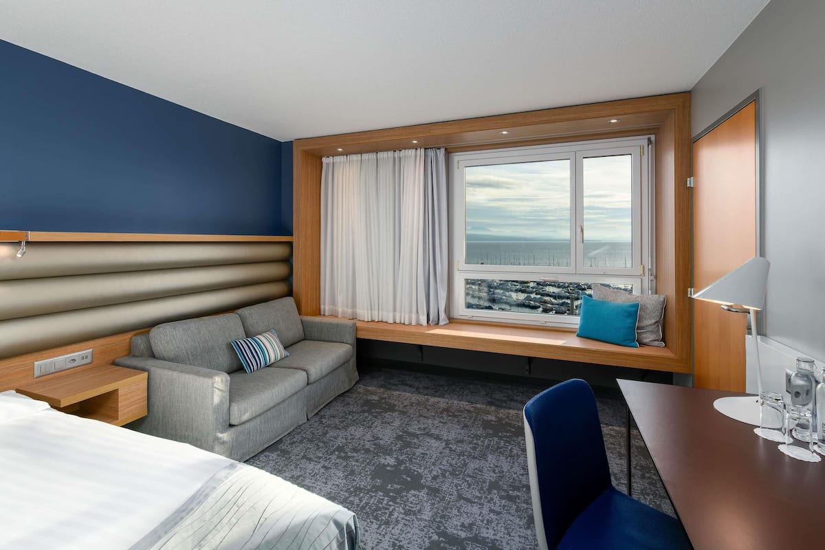 Luxe beddengoed, een minibar, een kluis op de kamer, een bureau