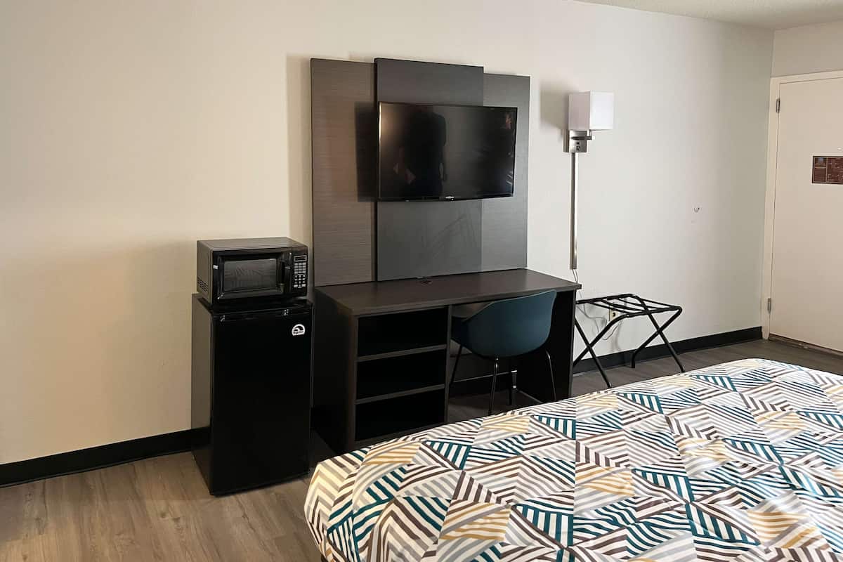 Desk, laptop workspace, blackout curtains, free WiFi