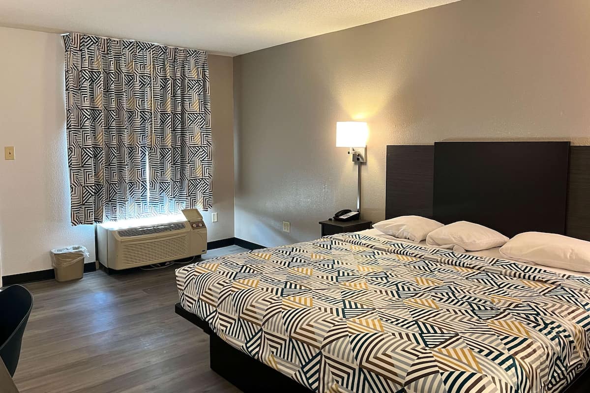 Desk, laptop workspace, blackout curtains, free WiFi