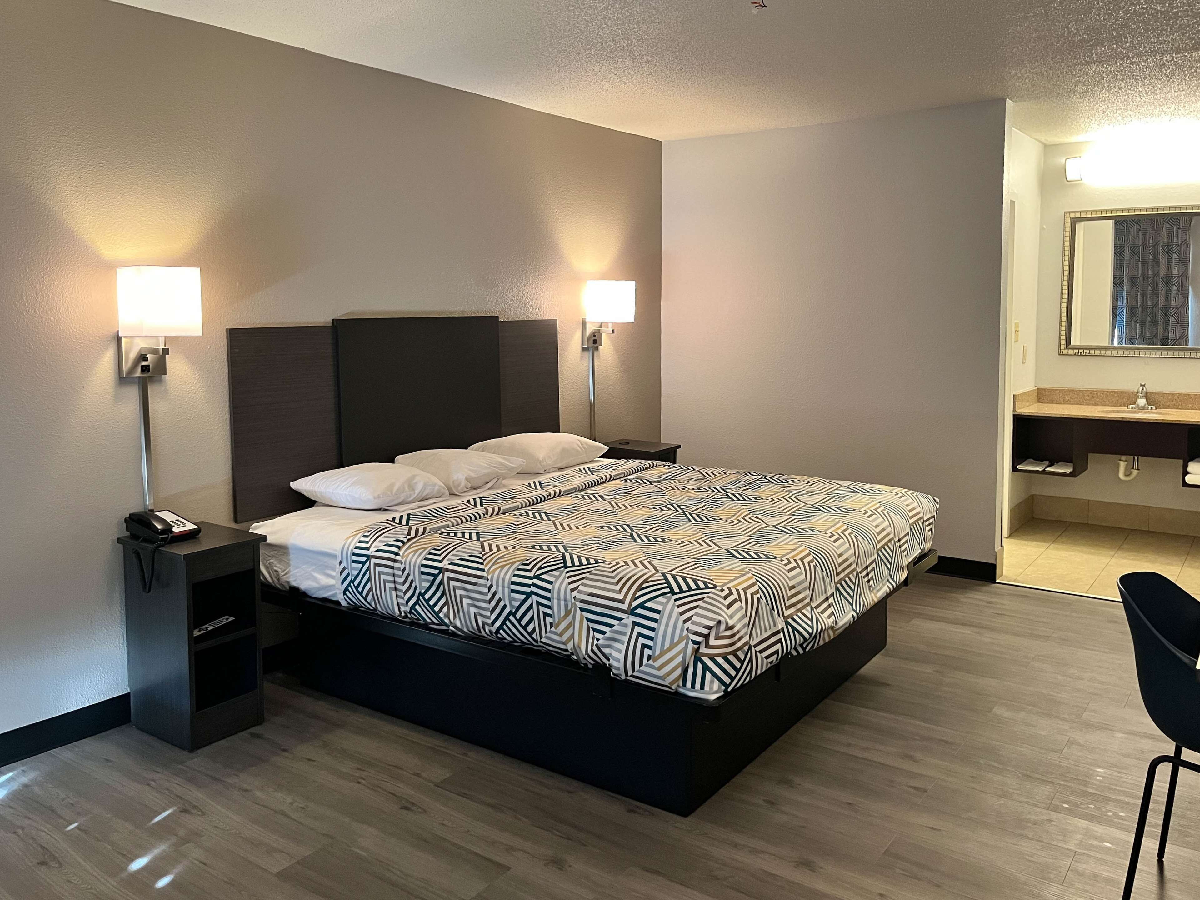 Desk, laptop workspace, blackout curtains, free WiFi