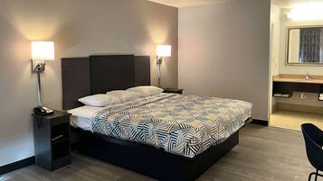 Desk, laptop workspace, blackout curtains, free WiFi