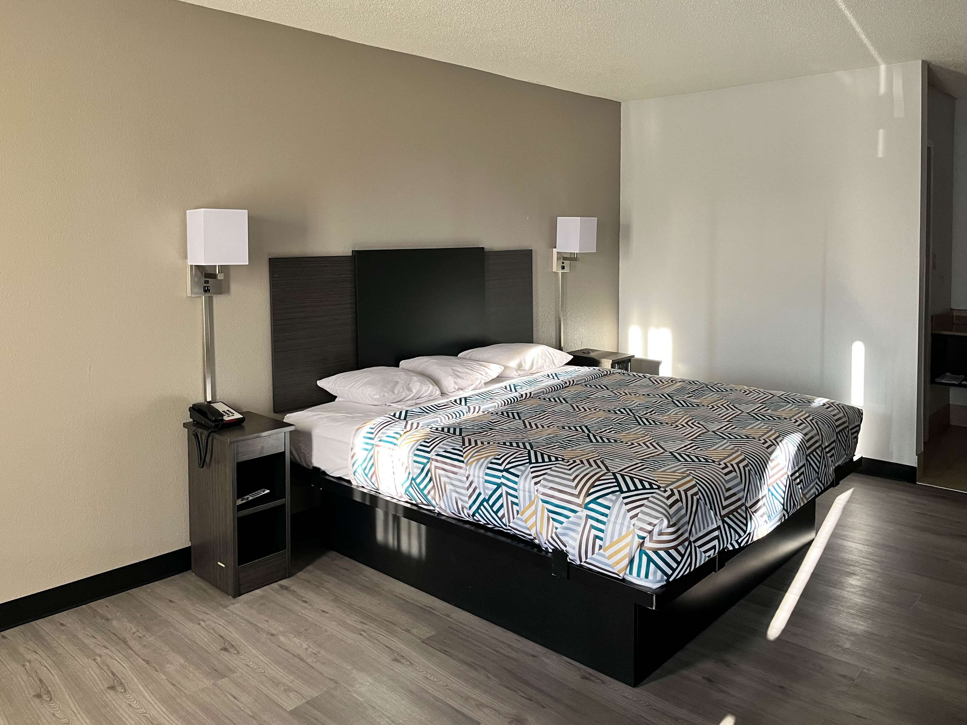 Desk, laptop workspace, blackout curtains, free WiFi