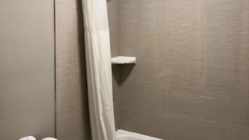 Combined shower/tub, hair dryer, towels, soap