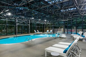 Indoor pool, seasonal outdoor pool, pool umbrellas, sun loungers