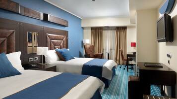 Premium bedding, down comforters, Tempur-Pedic beds, minibar