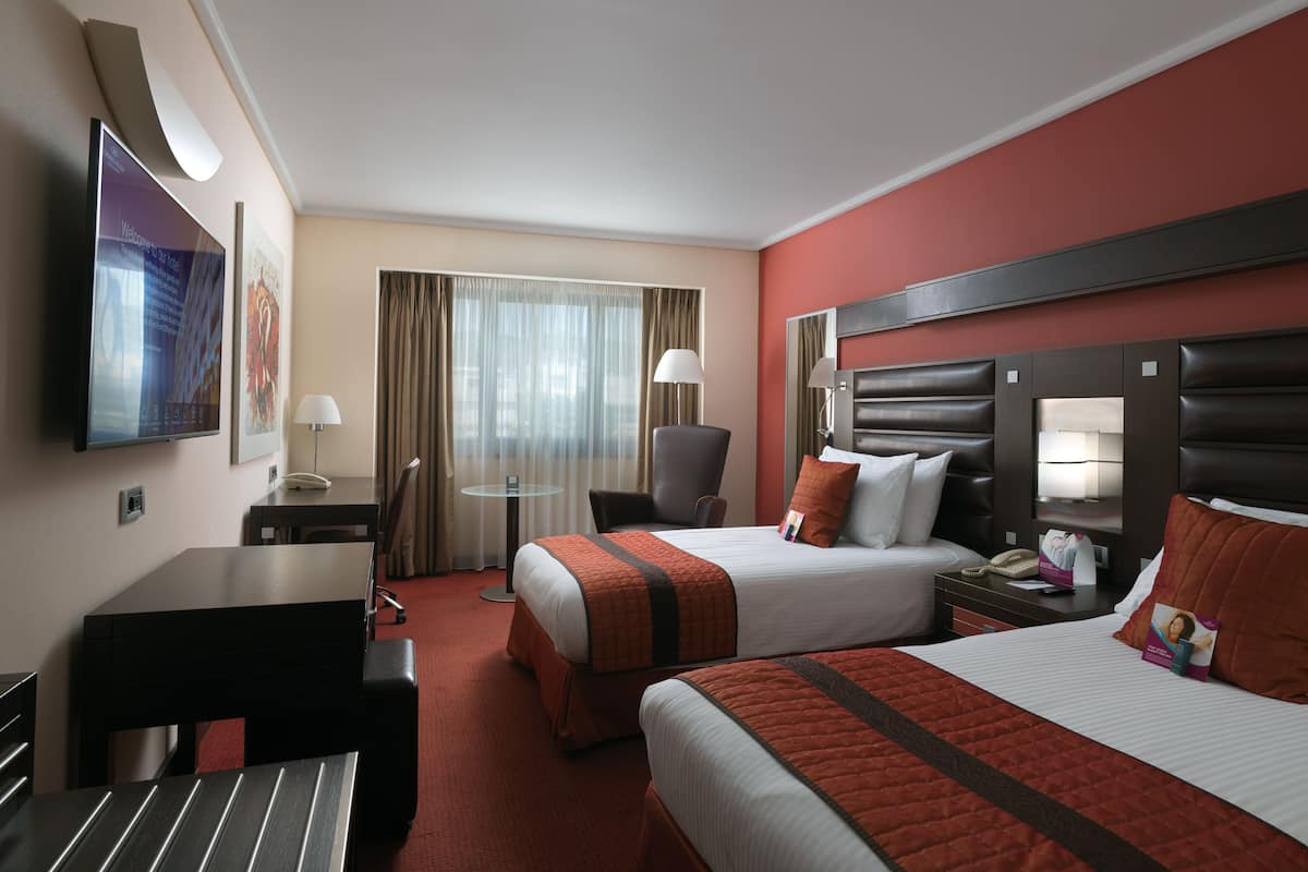 Premium bedding, down duvets, Tempur-Pedic beds, minibar