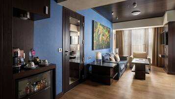 Premium bedding, down comforters, Tempur-Pedic beds, minibar