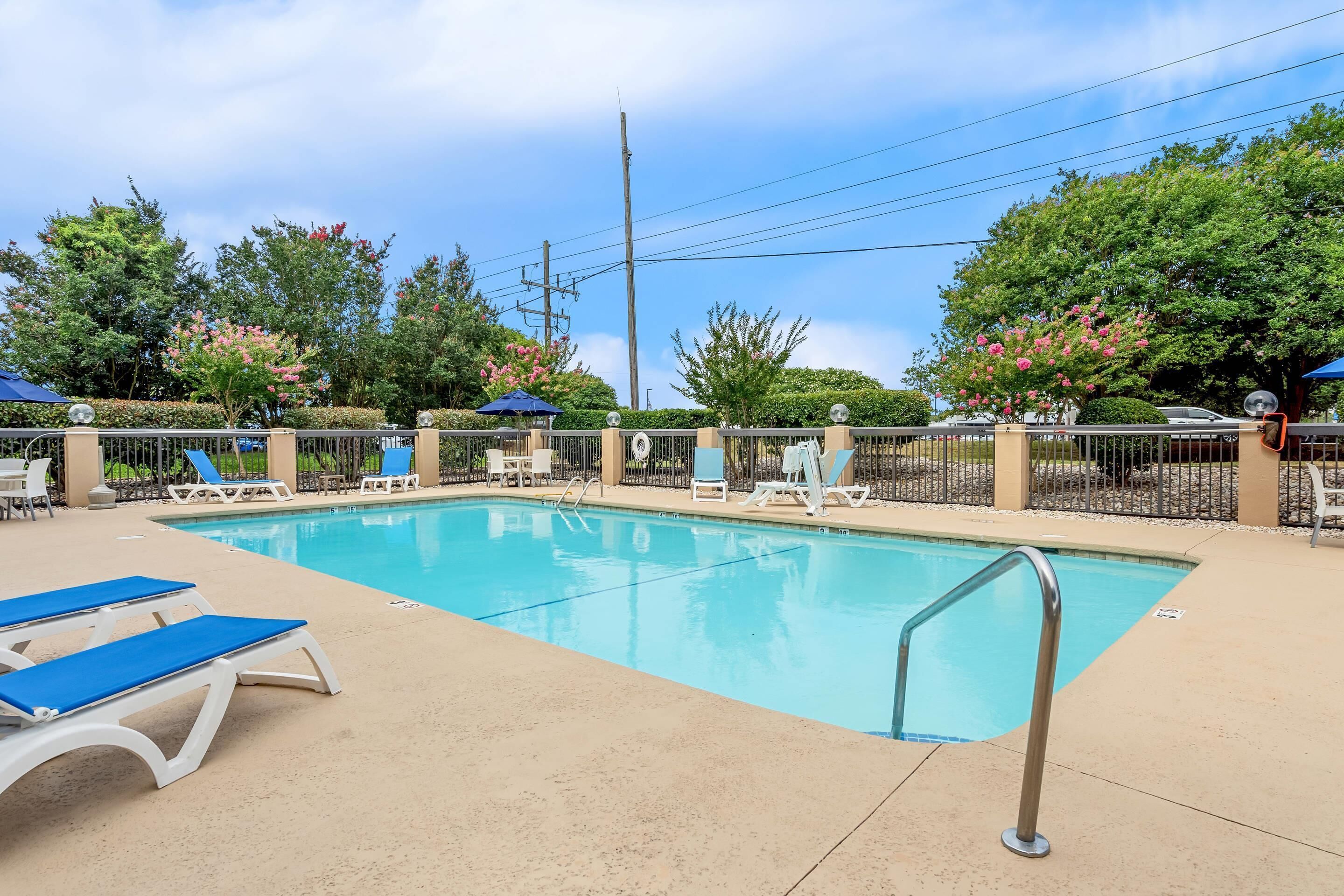 Seasonal outdoor pool, open 9 AM to 9 PM, pool loungers