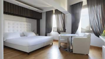 Superior Double Room | Minibar, in-room safe, desk, blackout drapes