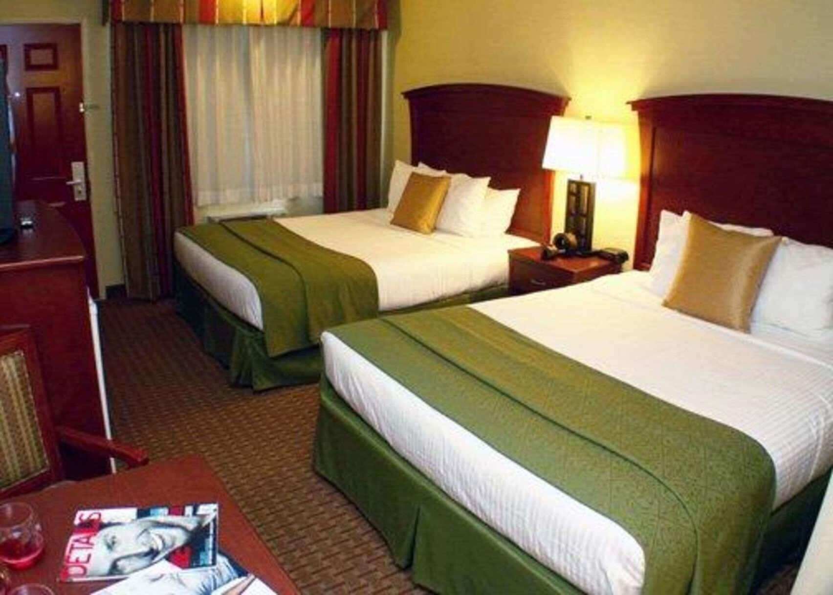 Premium bedding, pillowtop beds, blackout drapes, iron/ironing board