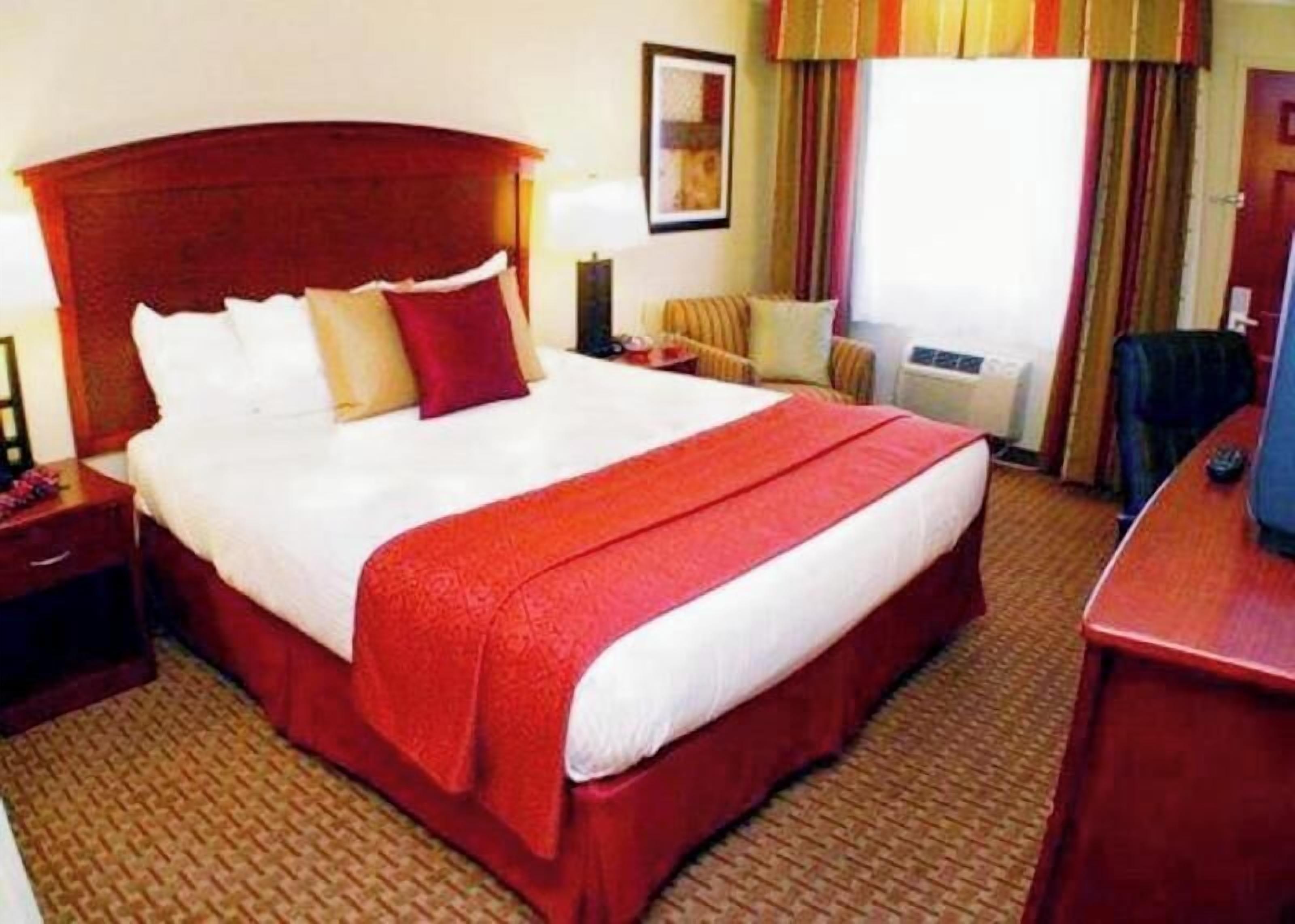 Premium bedding, pillowtop beds, blackout drapes, iron/ironing board