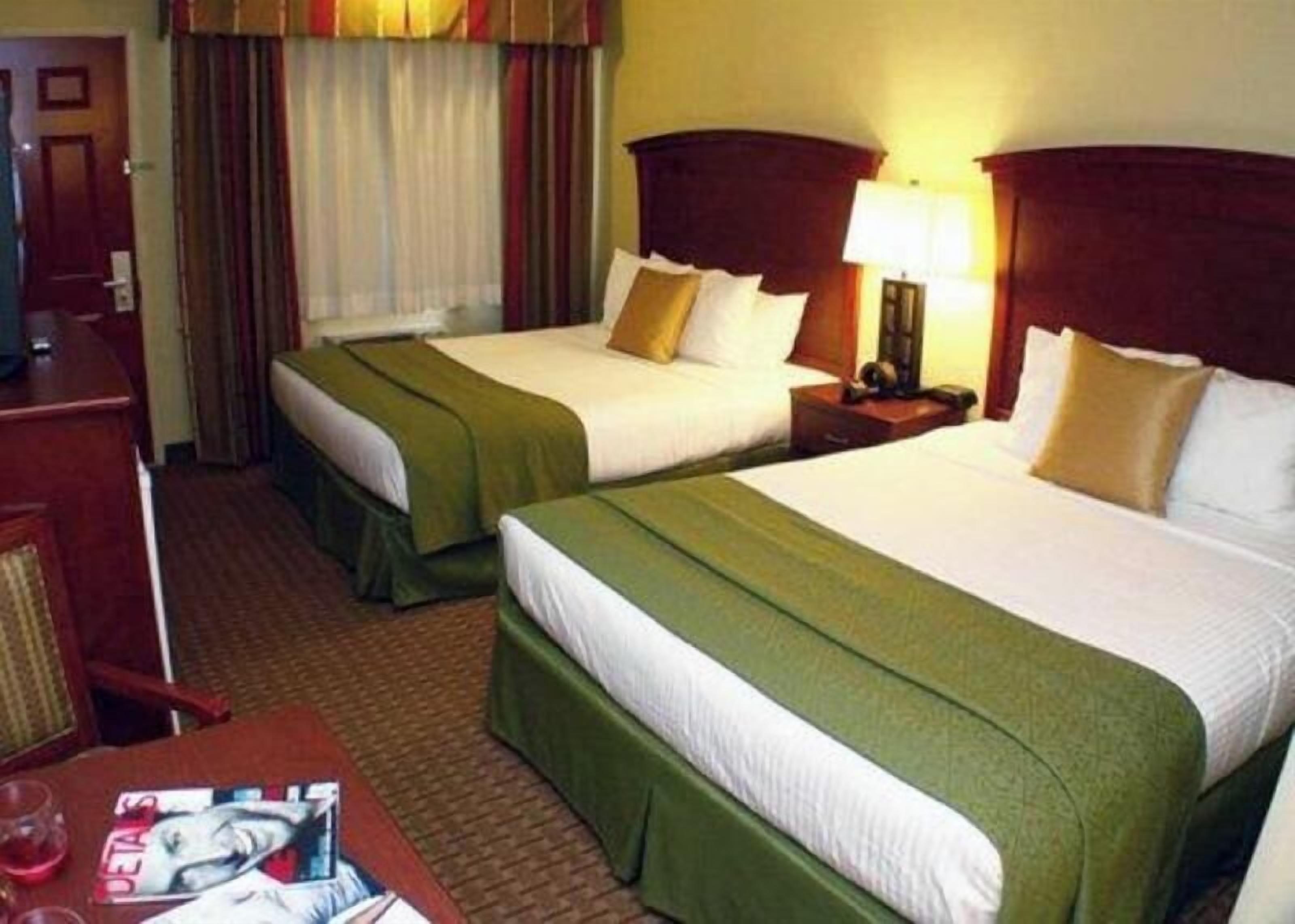 Premium bedding, pillowtop beds, blackout drapes, iron/ironing board