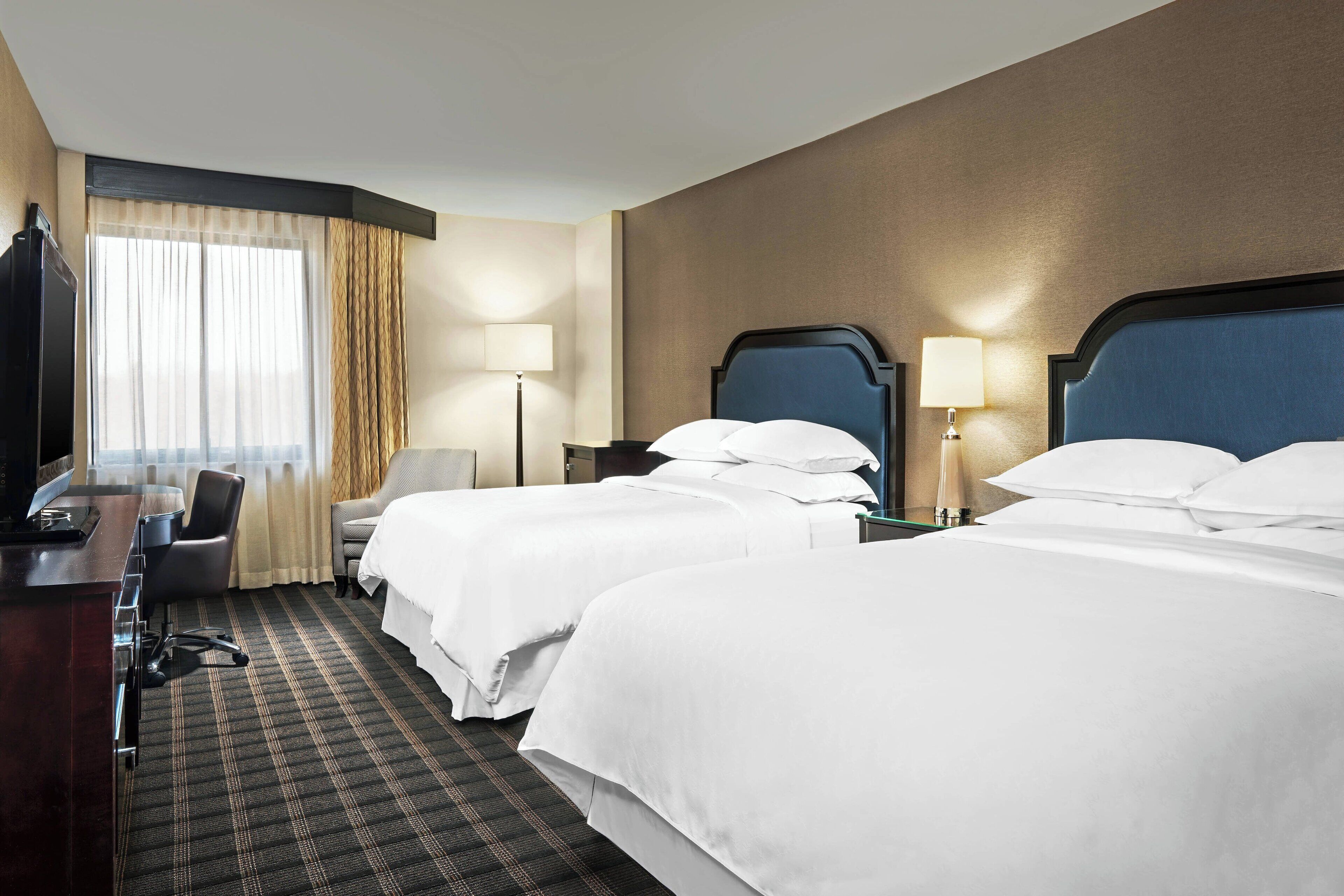 premium bedding, down duvets, pillow-top beds, in-room safe