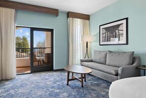 Desk, laptop workspace, blackout drapes, iron/ironing board