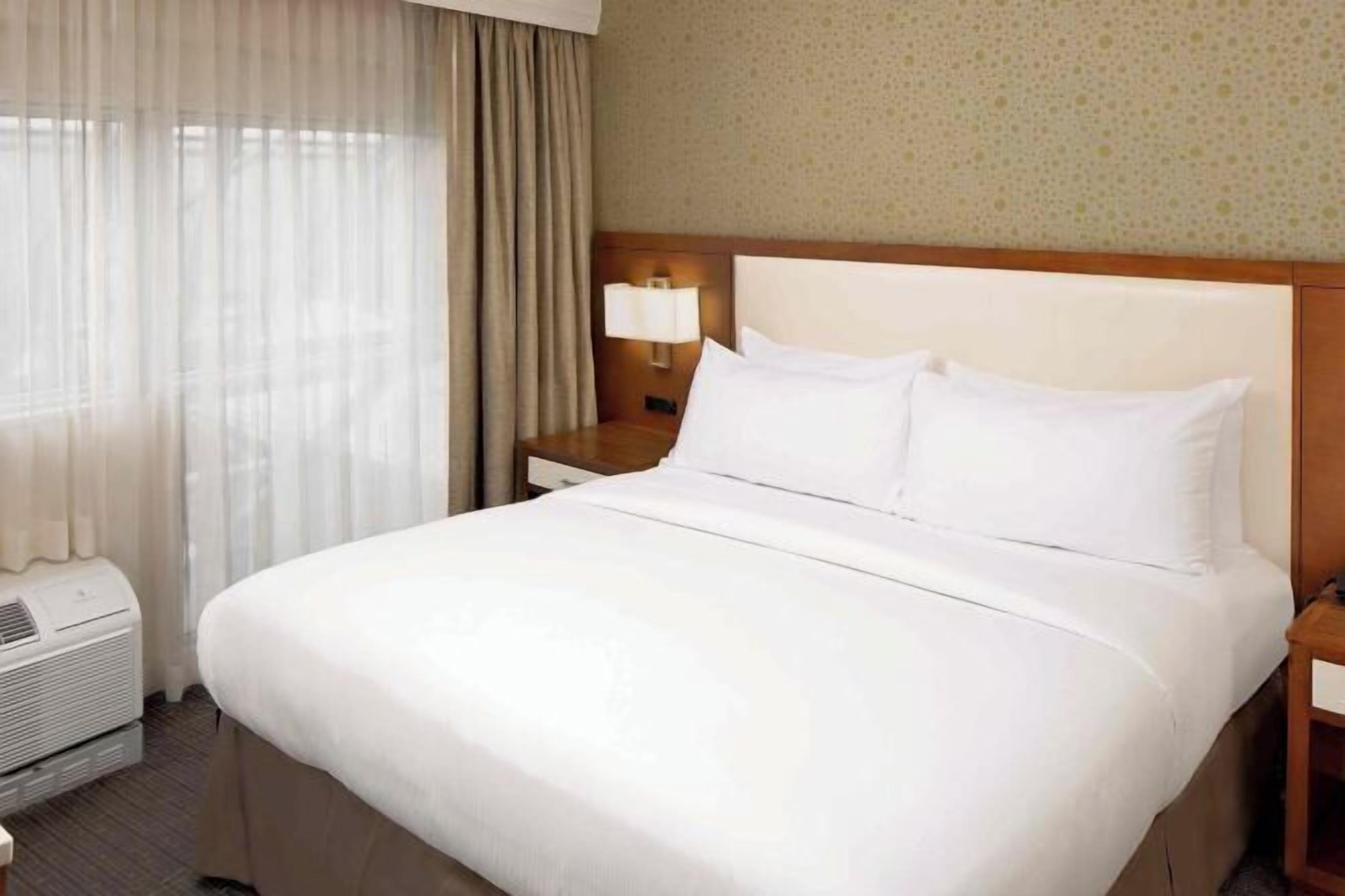 Premium bedding, pillowtop beds, in-room safe, blackout drapes