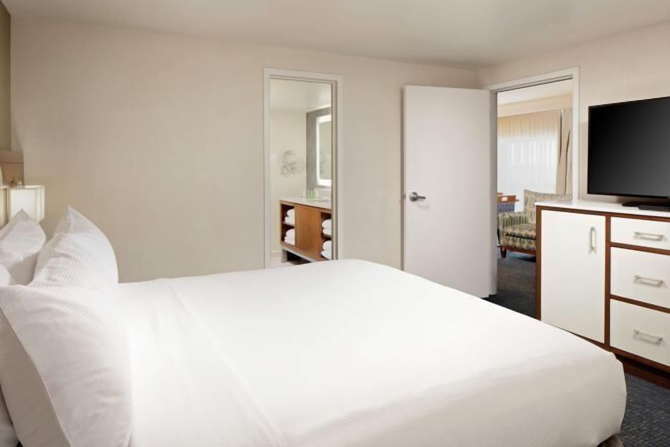 Premium bedding, pillowtop beds, in-room safe, blackout drapes