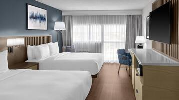 Luxe beddengoed, pillowtop-bedden, een kluis op de kamer