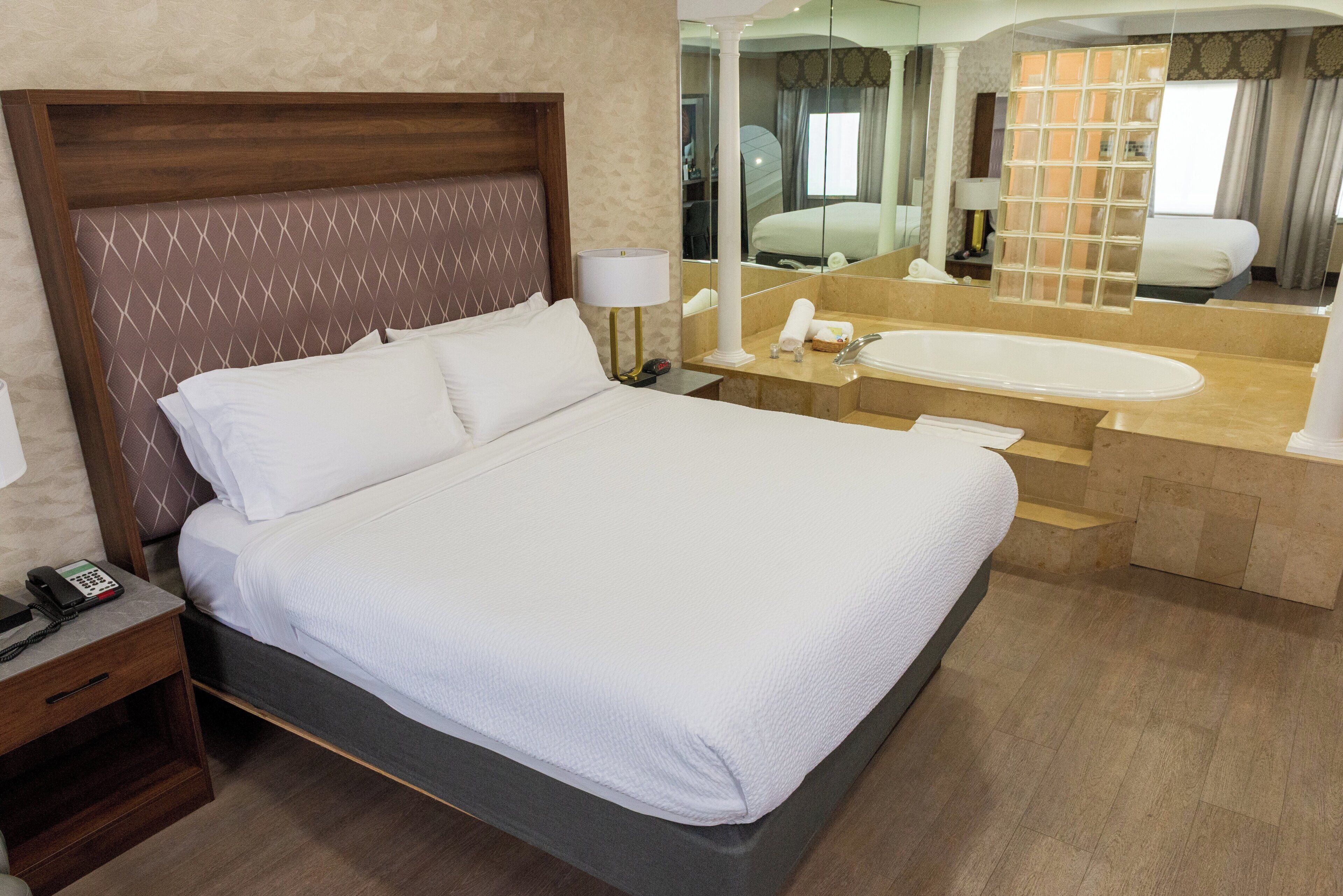 Suite, 1 Bedroom, Jetted Tub | 1 bedroom, in-room safe, desk, laptop workspace