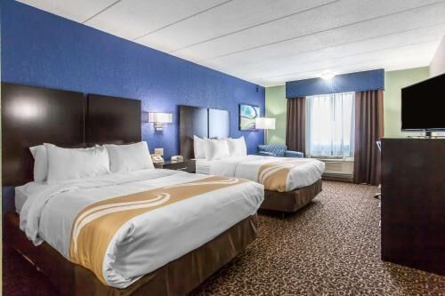 Premium bedding, blackout curtains, iron/ironing board, free WiFi