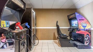 Enjoy gaming sessions with friends and family at this entertainment area, featuring a range of popular arcade games.