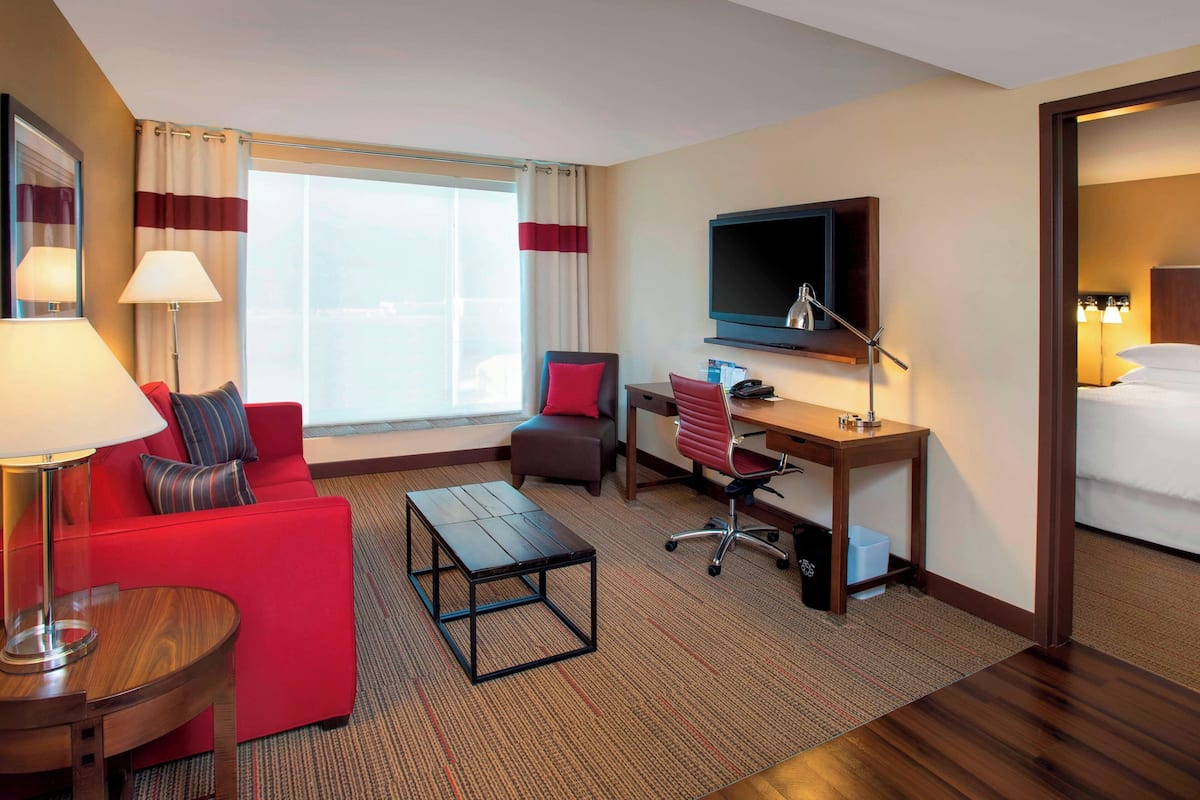 Suite, 1 Bedroom | Desk, iron/ironing board, free cribs/infant beds, free rollaway beds