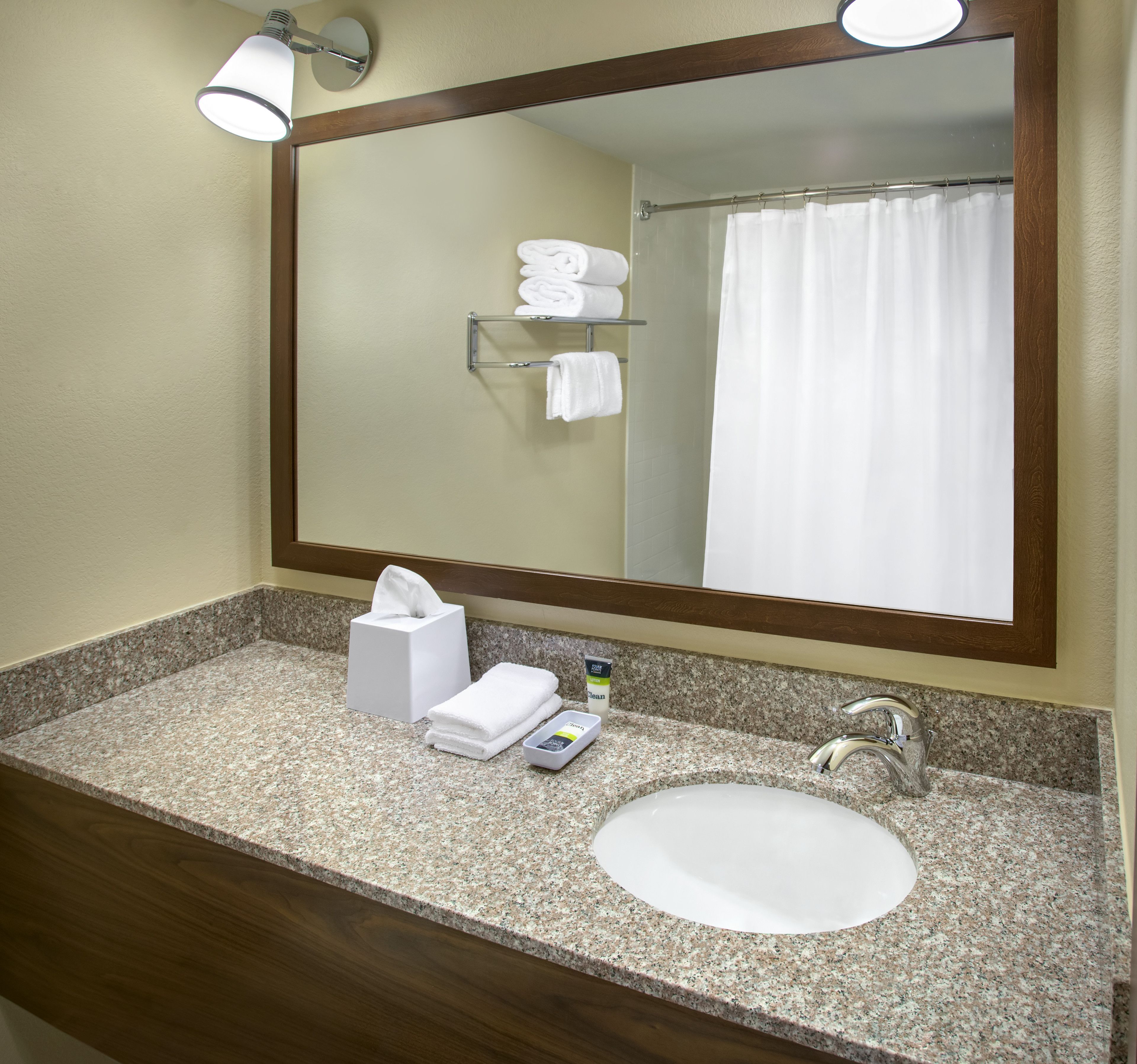 combined shower/bathtub, eco-friendly toiletries, hair dryer, towels