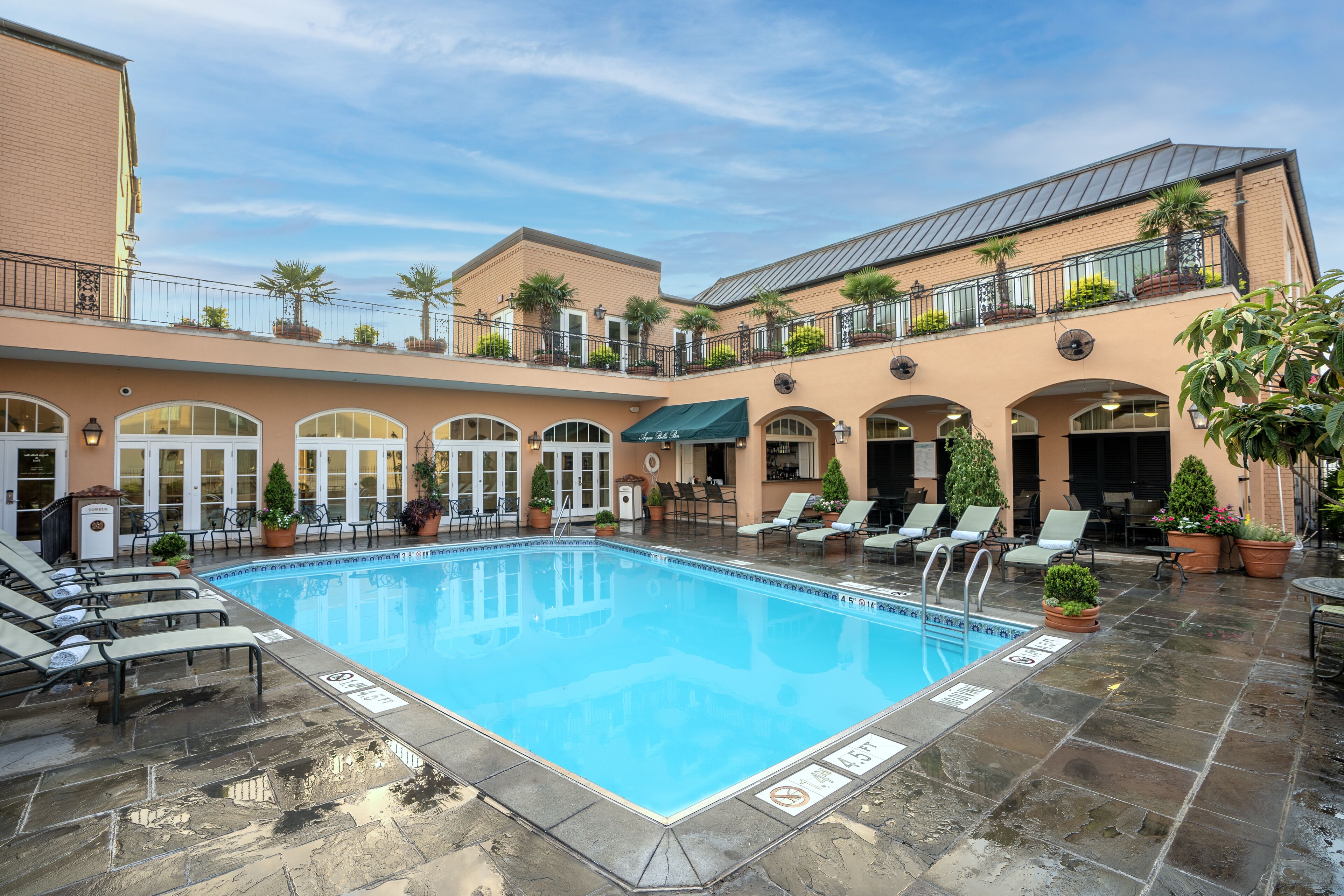 outdoor pool, open 6:00 am to 10:00 pm, pool loungers