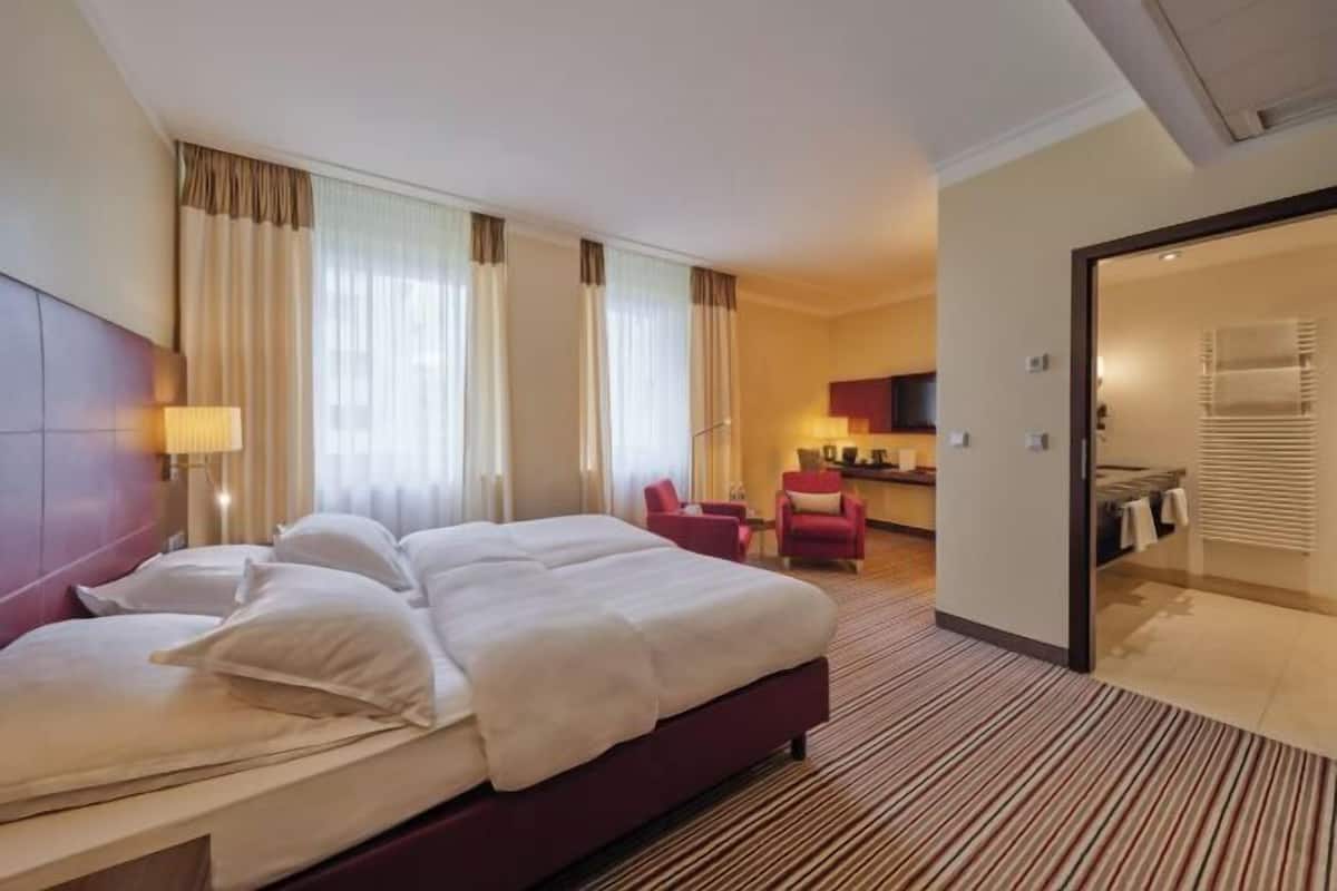 Ropa de cama de alta calidad y minibar
